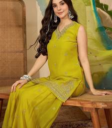 Ethnic motifs embroidered zari kurta with sharara & dupatta