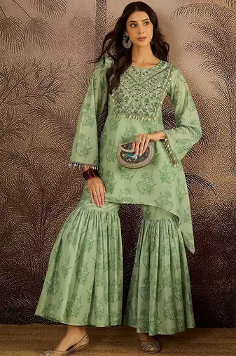 Women floral embroidered regular beads and stones kurta with sharara kurta sets