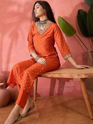 Orange floral printed silk blend v-neck straight kurta with trousers 1