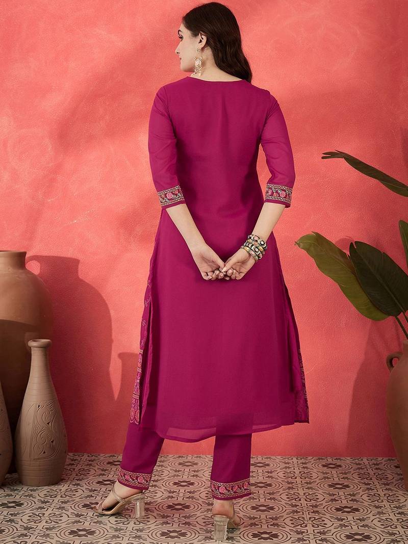Floral embroidered v-neck sequinned empire a-line kurta trousers