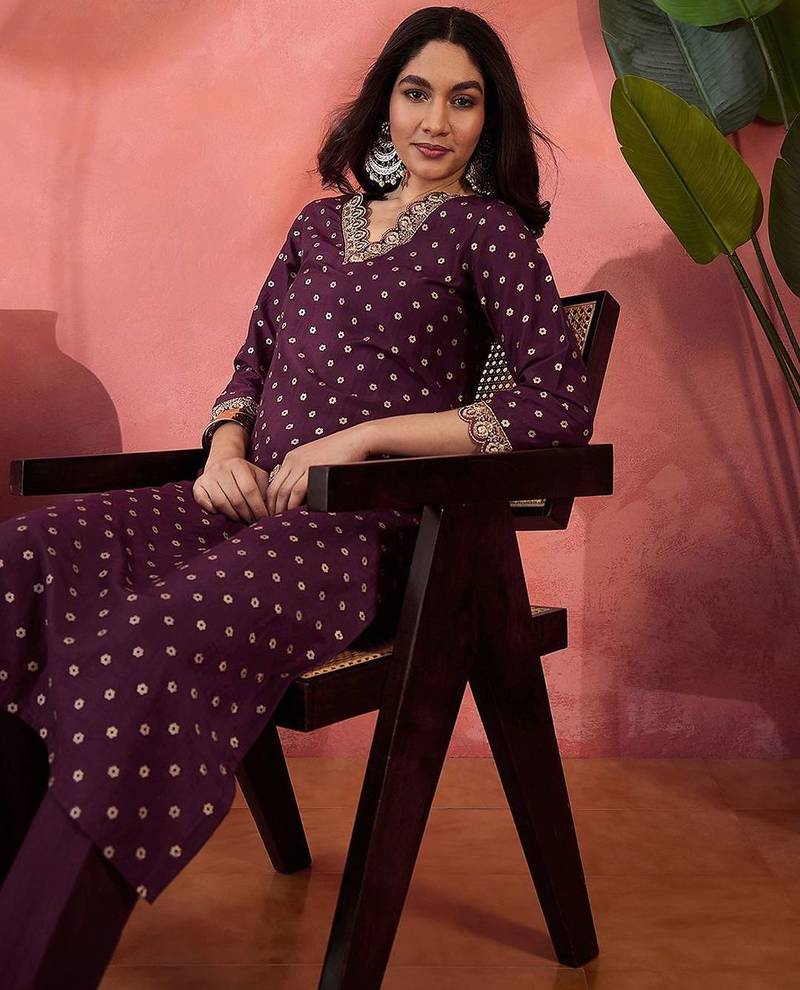 Foil printed with zari sequence embroidered a-line kurta & trousers