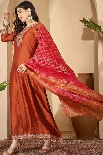 Orange vichitra zari sequence thread cording embroidered gown