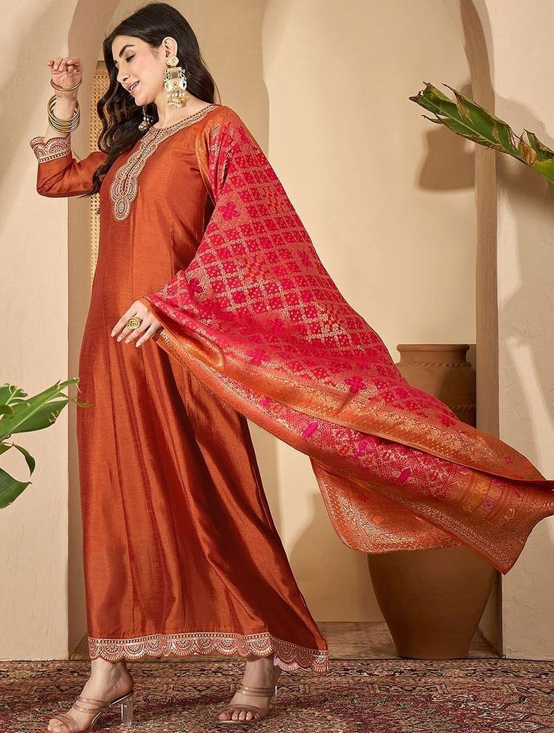 Orange vichitra zari sequence thread cording embroidered gown