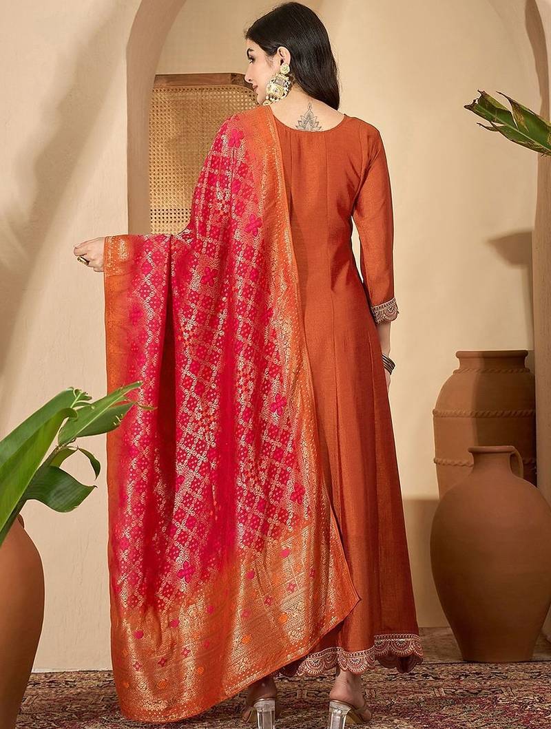 Orange vichitra zari sequence thread cording embroidered gown