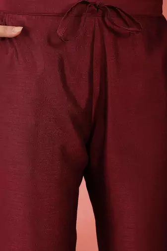 Floral embroidered round neck sequinned straight kurta with trousers and dupatta