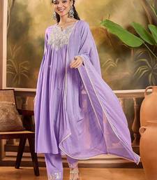 Women thread embroidered with mirror work a-line kurta with trousers & dupatta