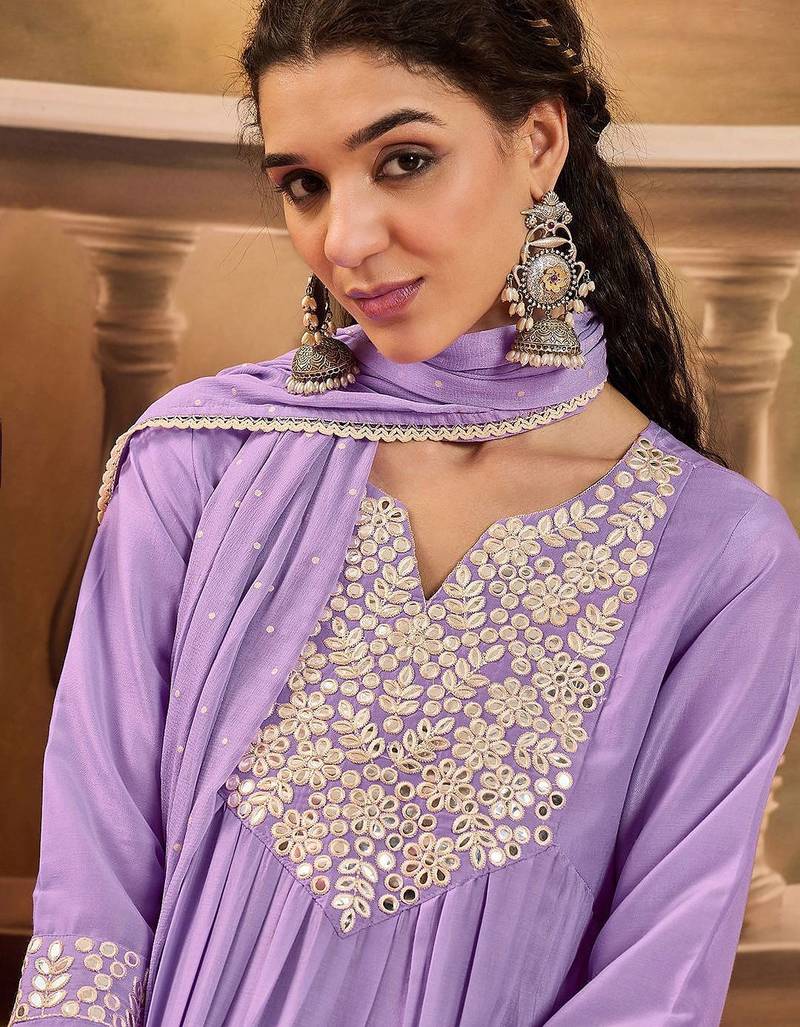 Women thread embroidered with mirror work a-line kurta with trousers & dupatta