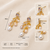Gold-tone chandelier drop earrings with freshwater pearls and crystal cz stud, 38mm length, 13mm width