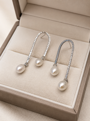 Silver tone freshwater pearl drop earrings, textured arc hook, elegant dangle style 2