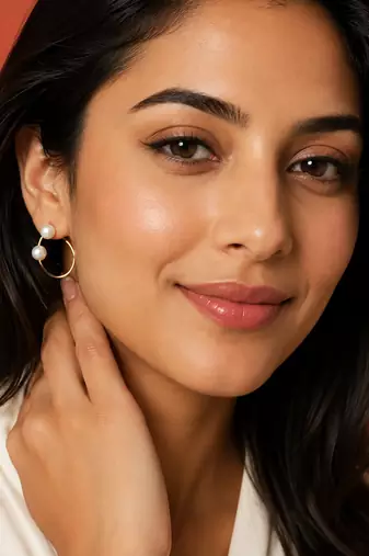 Gold-tone pearl hoop earrings, open circle design with dual white pearls, elegant jewellery for women