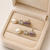 Pearl drop earrings with ruby red cz marquise stud and baguette crystal, silver tone
