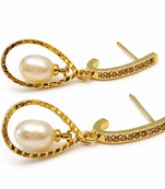 Gold-toned pearl drop earrings with crystal-studded hoop, teardrop frame, elegant dangle style
