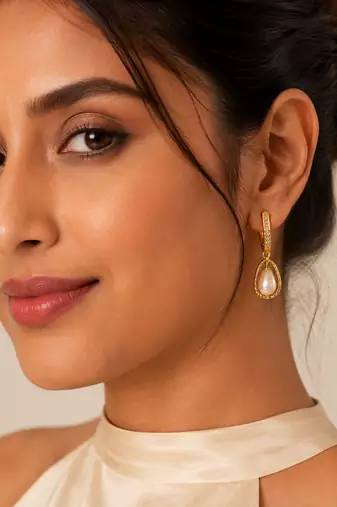 Gold-toned pearl drop earrings with crystal-studded hoop, teardrop frame, elegant dangle style