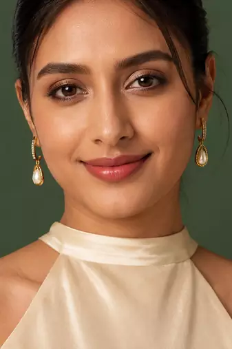 Gold-toned pearl drop earrings with crystal-studded hoop, teardrop frame, elegant dangle style