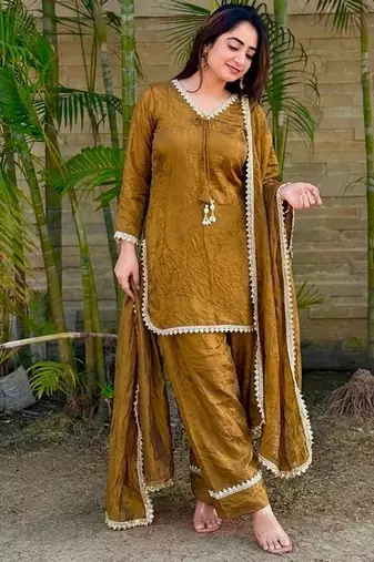  gold chanderi silk kurta set with delicate lace detailing and matching dupatta