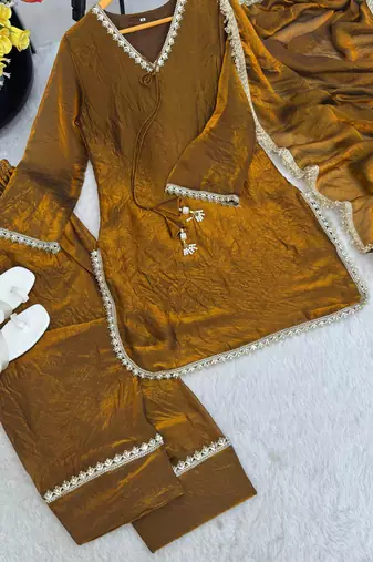  gold chanderi silk kurta set with delicate lace detailing and matching dupatta
