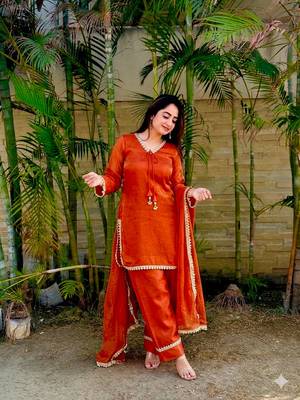 New trendy elegant orange chanderi silk kurta set with delicate lace detailing and matching dupatta 2