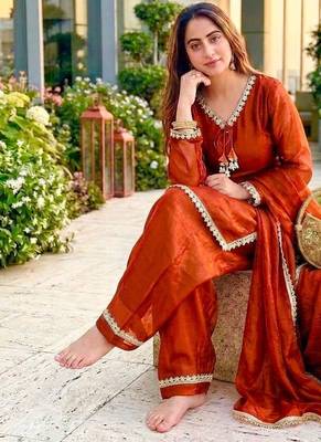 New trendy elegant orange chanderi silk kurta set with delicate lace detailing and matching dupatta 3