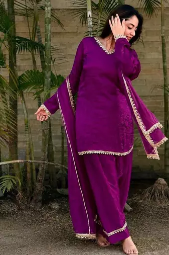New trendy elegant wine chanderi silk kurta set with delicate lace detailing and matching dupatta