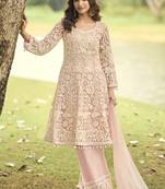 Light-peach wich net embroiderde plazoo suit