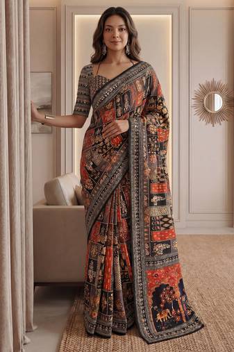 Rust Silk blend ajrak print mirror work saree