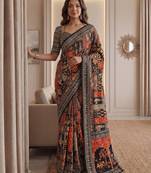 Rust Silk blend ajrak print mirror work saree