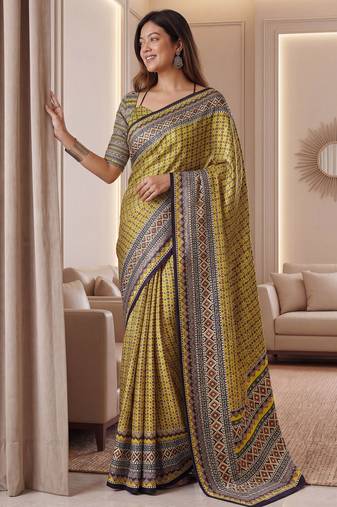 Yellow Silk blend ajrak print mirror work saree