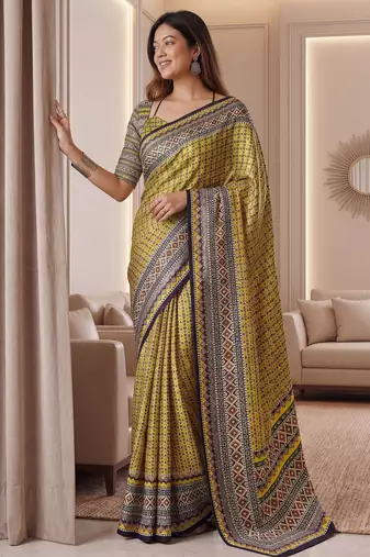 Yellow Silk blend ajrak print mirror work saree