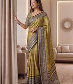 Yellow Silk blend ajrak print mirror work saree