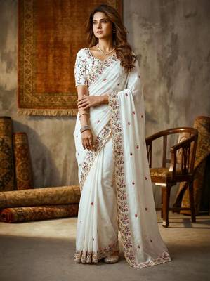 white Silk blend embroidered cutwork border saree 1