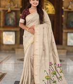 Cream cotton silk saree with colorful floral weaving pallu with blouse