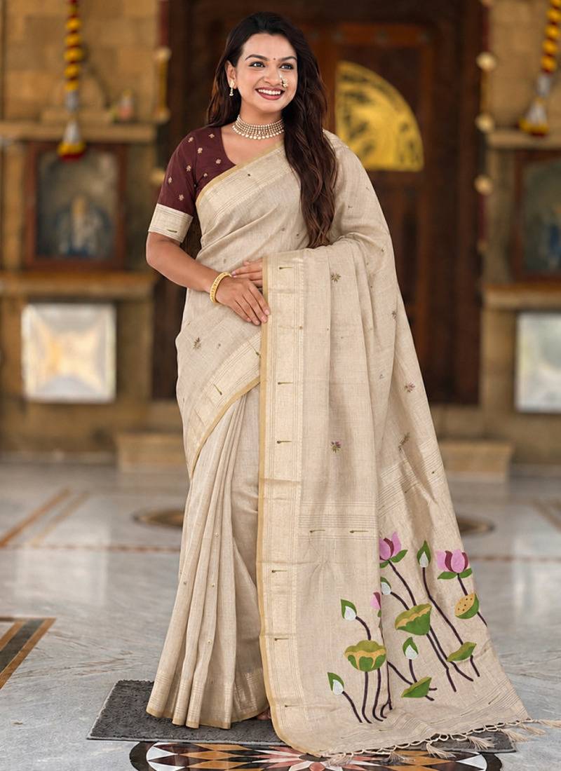 Cream cotton silk saree with colorful floral weaving pallu with blouse