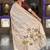 Cream cotton silk saree with colorful floral weaving pallu with blouse