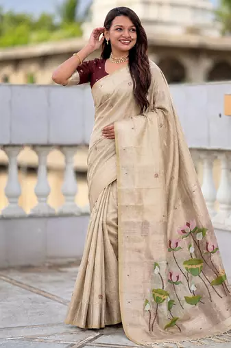 Cream cotton silk saree with colorful floral weaving pallu with blouse