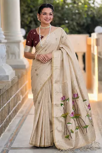 Cream cotton silk saree with colorful floral weaving pallu with blouse