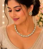 White color kundan & ad stone necklace set with earrings, gold plated