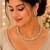 White color kundan & ad stone necklace set with earrings, gold plated