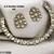 White color kundan & ad stone necklace set with earrings, gold plated