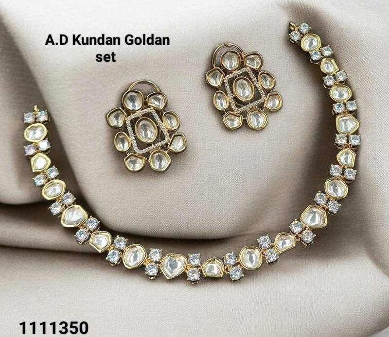 White color kundan & ad stone necklace set with earrings, gold plated