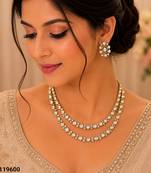 White color kundan & ad stone necklace set with earrings, gold plated
