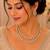White color kundan & ad stone necklace set with earrings, gold plated
