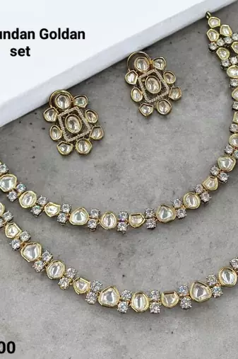 White color kundan & ad stone necklace set with earrings, gold plated