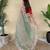 Green embroiedery work two tone silk saree