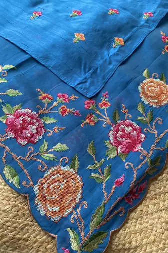 Blue matka silk saree with heavy floral embroidery border with running blouse