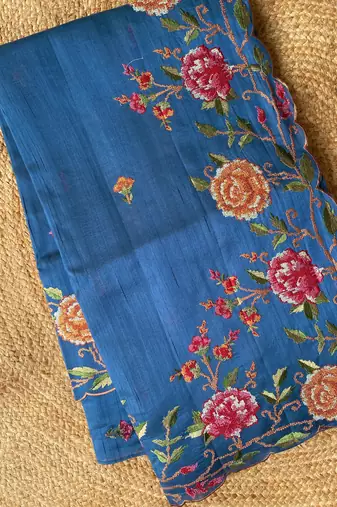 Blue matka silk saree with heavy floral embroidery border with running blouse