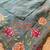 Sea-green matka silk saree with heavy floral embroidery border with running blouse