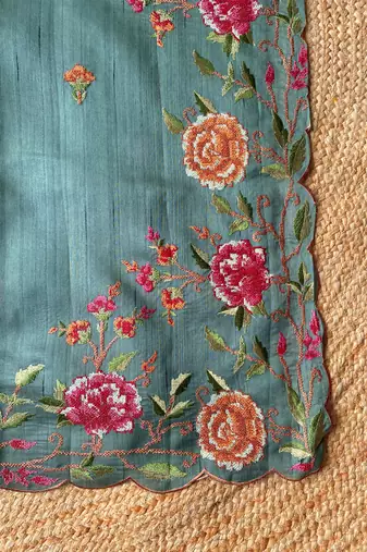 Sea-green matka silk saree with heavy floral embroidery border with running blouse