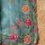 Sea-green matka silk saree with heavy floral embroidery border with running blouse