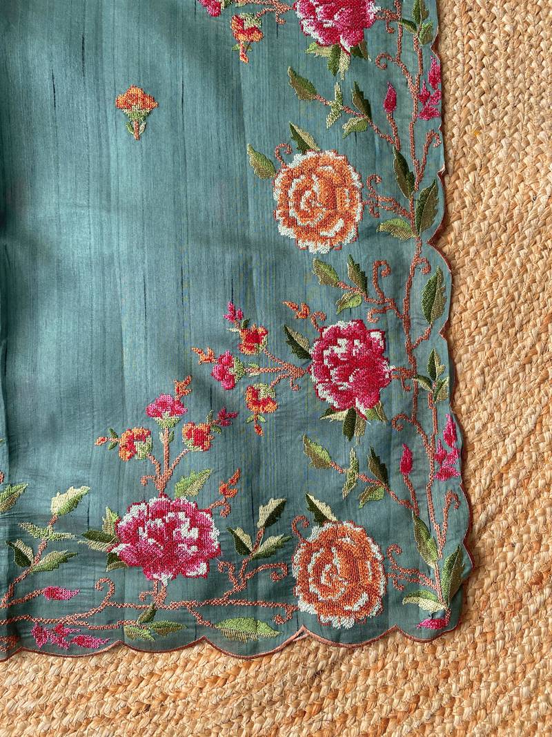 Sea-green matka silk saree with heavy floral embroidery border with running blouse