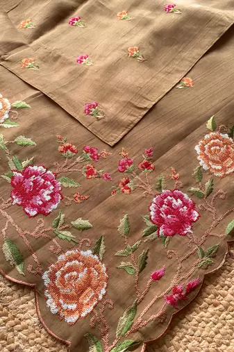 Brown matka silk saree with heavy floral embroidery border with running blouse